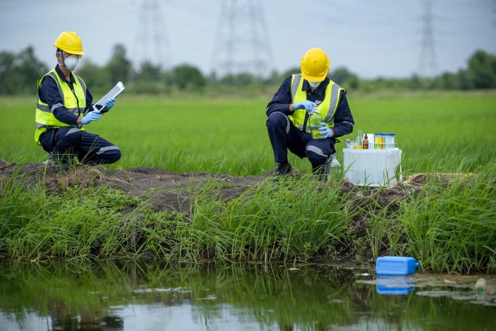 two men performing an environmental transaction screen process