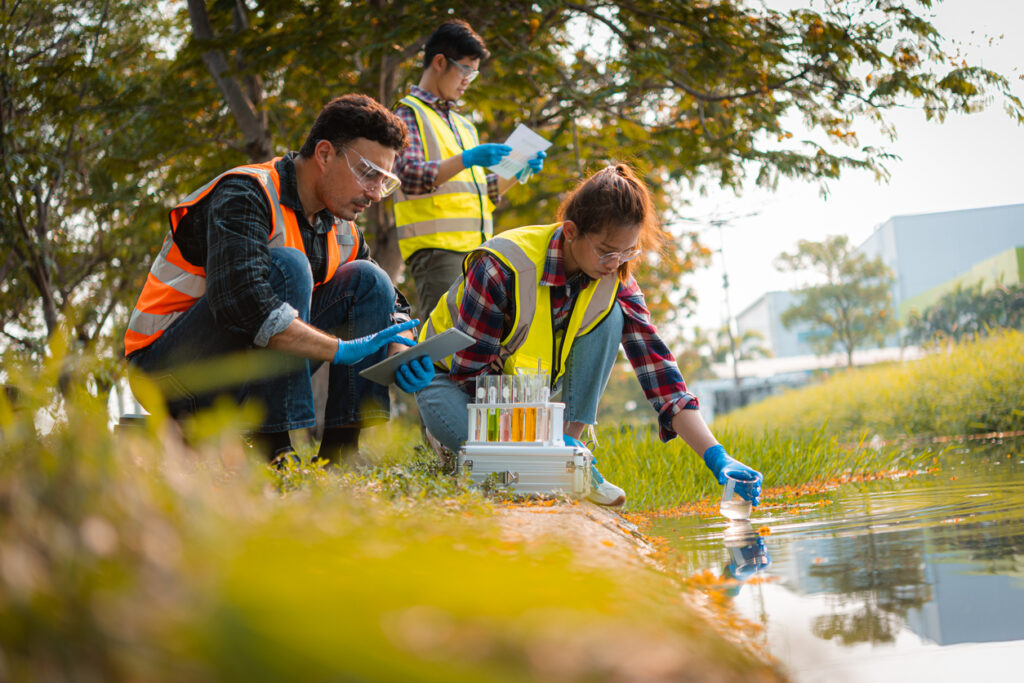 three ESA specialists performing water inspection