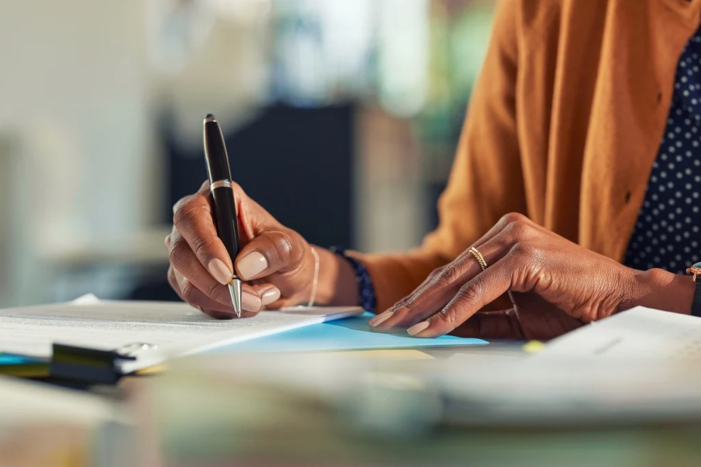 woman writing a reliance letter