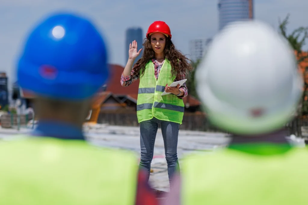 woman holding out her hand to point out key considerations for an environmental phase I assessment