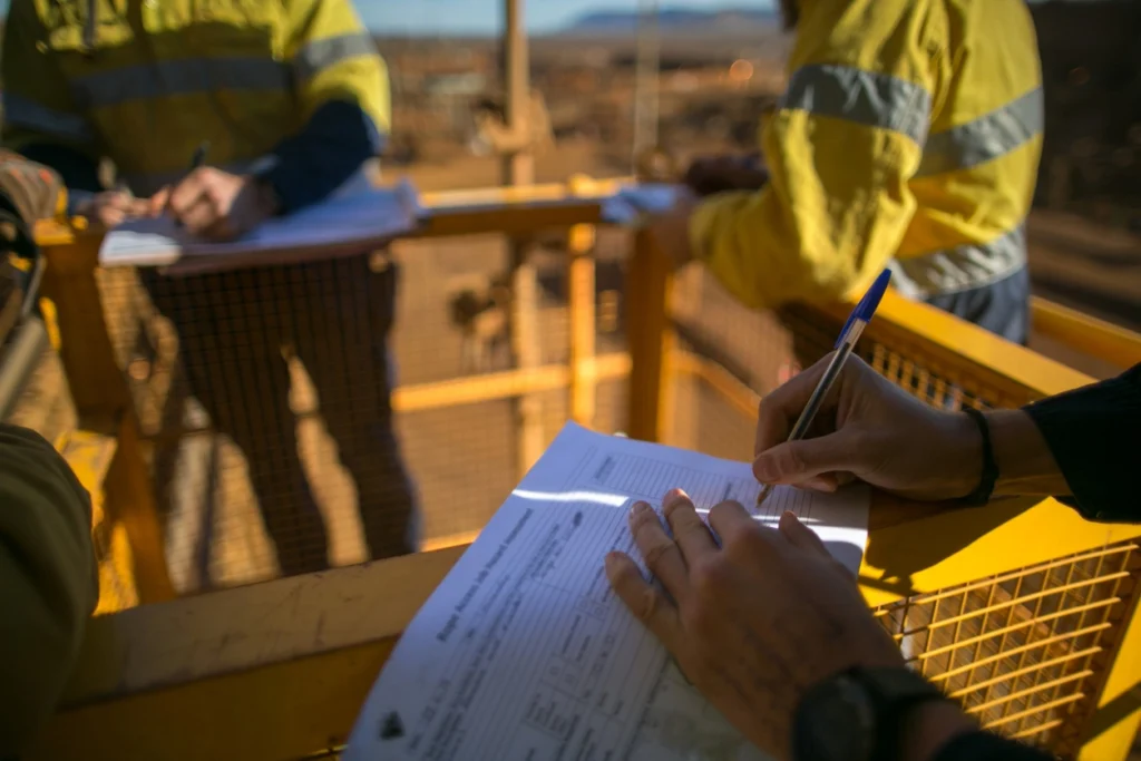 man filling out a biological survey form