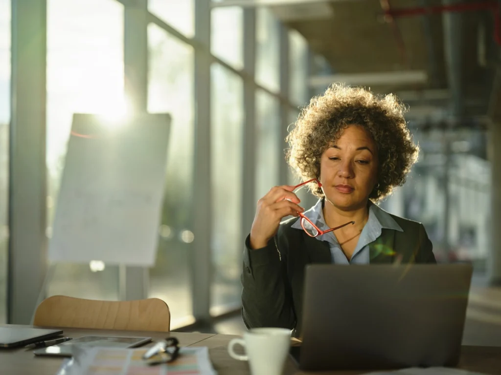 woman thinking whether a phase II ESA is right for her company