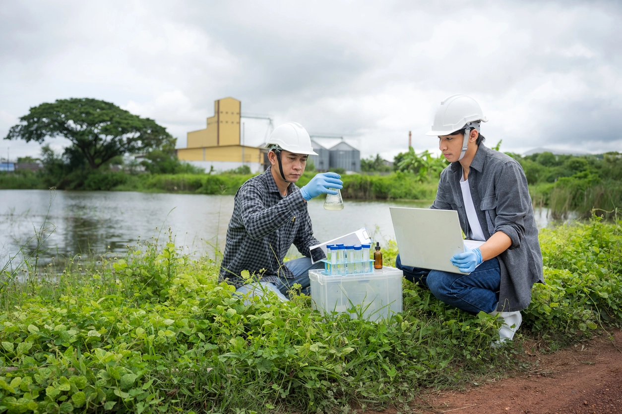 two environmental specialists performing a TSA or Phase I ESA